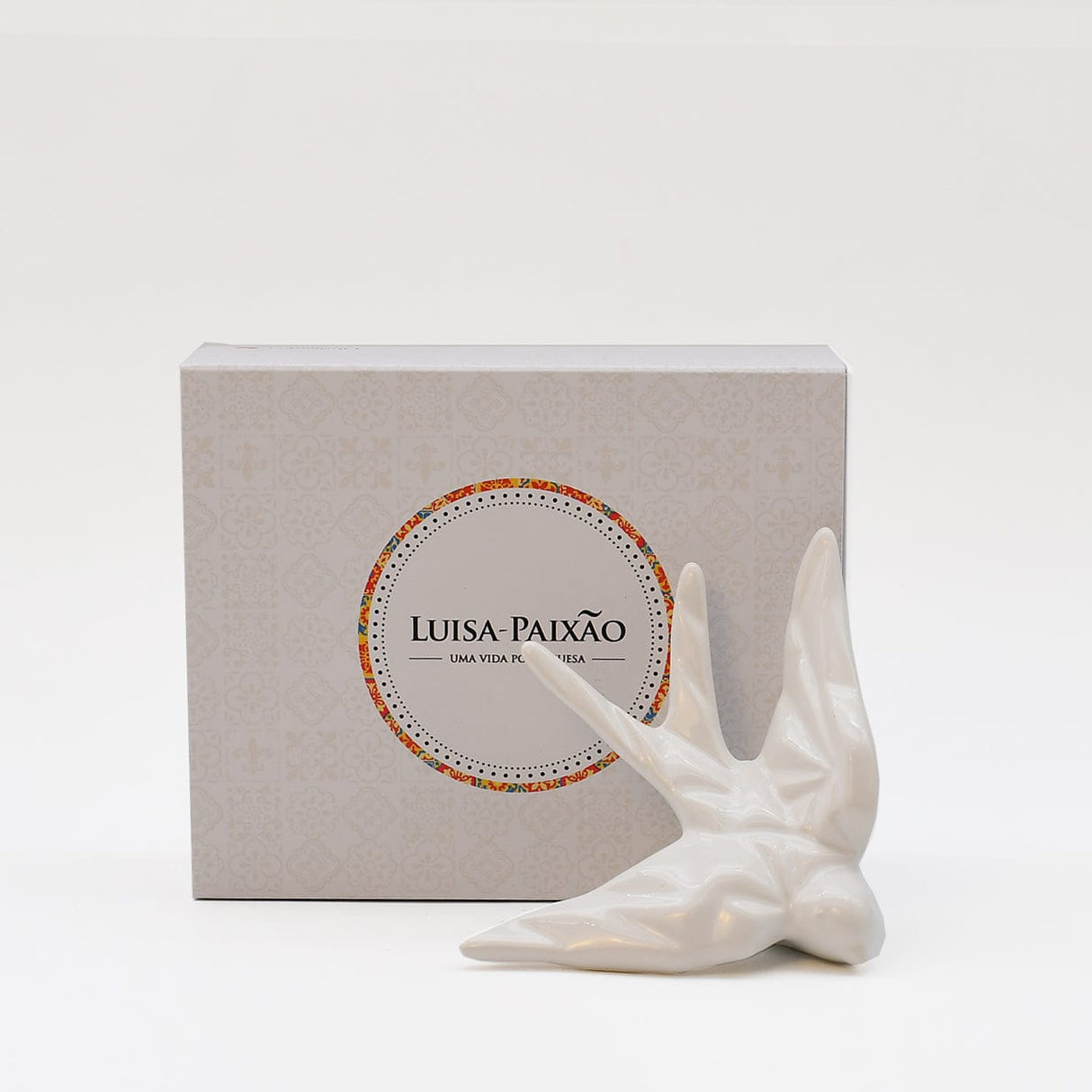 hirondelle en céramique stylisée et modernisée blanche, dans sa boîte cadeau Luisa Paixão. Coffret hirondelle stylisée - Blanc