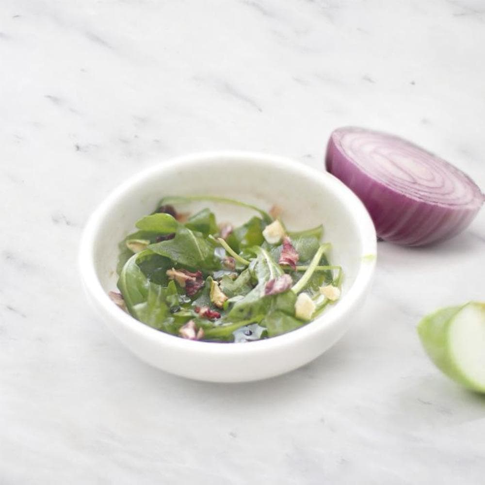 Tube d'oignons violets et pommes vertes déshydratés