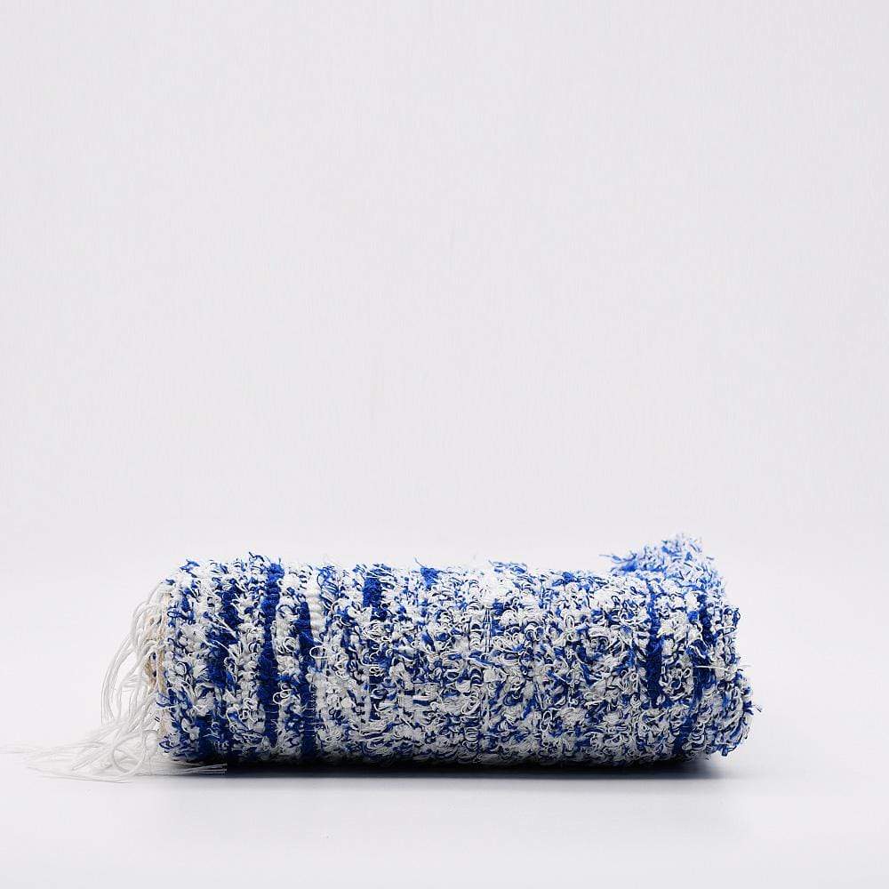 Tapis en coton chiné bleu