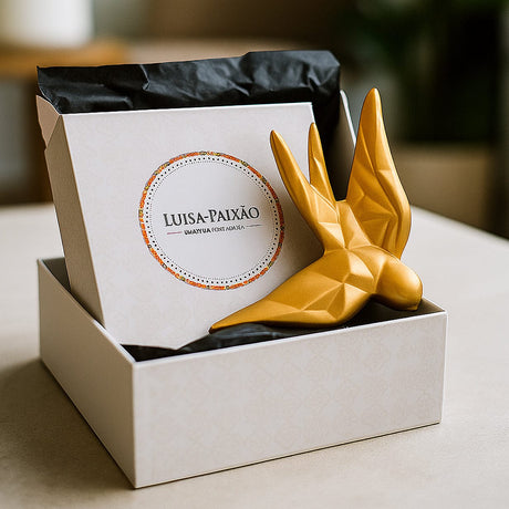 hirondelle en céramique stylisée et modernisée dorée, dans sa boîte cadeau Luisa Paixão.  Coffret hirondelle stylisée - Doré