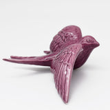 Hirondelle de Caldas da Rainha en céramique mauve