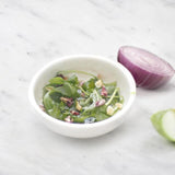 Tube d'oignons violets et pommes vertes déshydratés