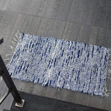 Tapis en coton chiné bleu