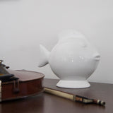 Tirelire en céramique blanche